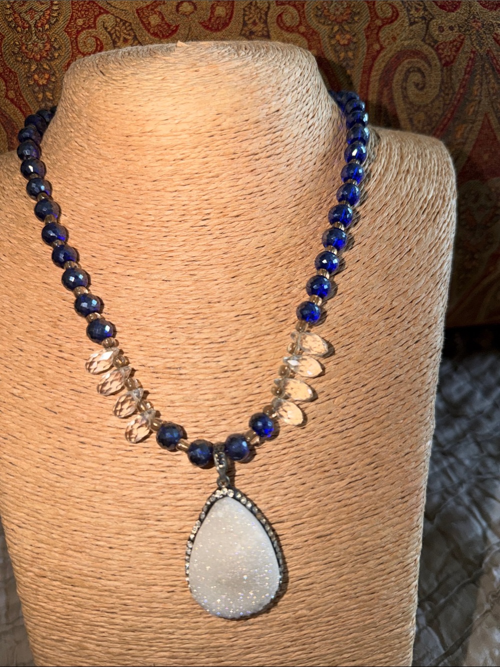 Crystal with druzy pendant embellished with crystals around the druzy